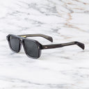 An image of the GR15 Aviator Sunglasses in Dark Grey frame side view with arms open marble background