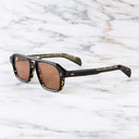 An image of the GR15 Aviator Sunglasses in Black on Havana frame side view with arms open marble background