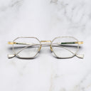 An image of the Lansdowne 1431 Square Opticals in Silver/Gold frame frontal view with arms closed marble background