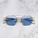 An image of the Cranley 1425 Aviator Sunglasses in Silver/Gold frame frontal view with arms closed marble background
