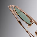 An image of the Draycott 1426 Round Sunglasses Jewel/Gold frame detail close up of left lens and temple