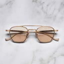 An image of the Cranley 1425 Aviator Sunglasses in Jewel Gold frame frontal view with arms closed marble background