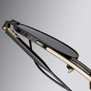 An image of the Draycott 1426 Round Sunglasses black/Gold frame detail close up of left lens and temple