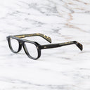 An image of the GR14 Aviator Opticals in Black frame side view with arms open marble background