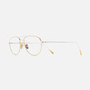 An image of the 0002 Aviator Opticals in 24K Yellow Gold + 18K Rhodium frame side view with arms open