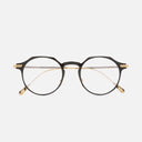 An image of the 0008 Round Opticals in Black on 24K Yellow Gold + 18K Rhodium frame frontal view with arms closed