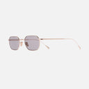 An image of the 0005 Round Sunglasses in Rose Gold frame side view with arms open