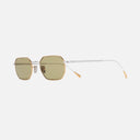 An image of the 0005 Round Sunglasses in 24K Yellow Gold + 18K Rhodium frame side view with arms open