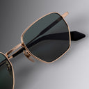 An image of the Breitling Léman 0001 Square Sunglasses Red Gold frame front view of the right lens and temple