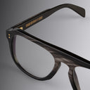 An image of the Cutler and Gross 0822V2 Aviator Horn Optical in Slate Grey Buffalo Horn frame detail close up of left lens and temple