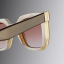 An image of the Cutler and Gross 4469 Square Horn Sunglass in Smoke Brown/Cream Buffalo Horn frame detail close up of right hinge and temple