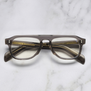 An image of the GR14 Aviator Opticals in Grey on Granny Chic frame frontal view with arms closed marble background