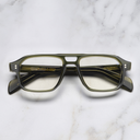 An image of the GR15 Aviator Opticals in Multi Olive frame frontal view with arms closed marble background
