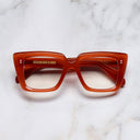 An image of the 1401 Cat Eye Opticals Rouge frame frontal view with arms closed Marble background