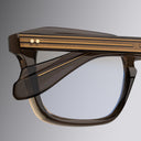 An image of the 1416 Square Optical in Brown Crystal frame detail close up of left hinge and temple