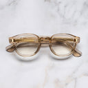 An image of the 9290 Round Opticals in Granny Chic frame frontal view with arms closed marble background