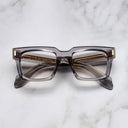 An image of the 9386 Square Optical in Smoke Quartz frame frontal view with arms closed marble background