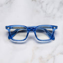 An image of the 9521 Square Opticals (Large) in Blue Crystal frame frontal view with arms closed marble background