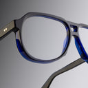 An image of the Cutler and Gross 9782 Aviator Optical in Classic Navy Blue frame detail close up of left hinge and temple