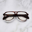 An image of the 9782 Aviator Optical in Dark Turtle frame frontal view with arms closed marble background