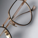 An image of the Pelham 1430 Round Opticals Pink Gold/Silver frame detail Close up of right lens and bridge