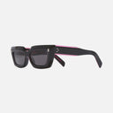 An image of the 1408 Cat Eye Sunglasses Black on Pink frame side view with arms open