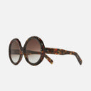 An image of the 1412 Round Sunglasses Brush Stroke frame side view with arms open