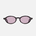 An image of the GR13 Oval Sunglasses in Black Horn frame side view with arms open marble background