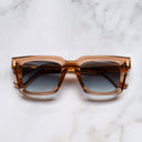 An image of the 1386 Square Sunglasses in Crystal Peach frame frontal view with arms closed marble background