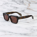 An image of the 1432 Square Sunglasses in Dark Havana frame side view with arms open marble background