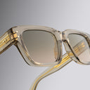 A close up image featuring classic Cutler and Gross D-frame in transparent sand crystal colour