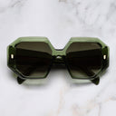 An image of the 9324 Square Sunglasses in Joshua Green frame frontal view with arms closed marble background