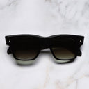 An image of the 9690 Square Sunglasses in Black frame frontal view with arms closed marble background