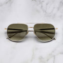 An image of the Sloane 1423 Aviator Sunglasses in Silver/Gold frame frontal view with arms closed marble background