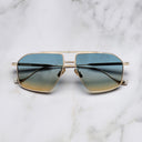 An image of the Kensington 1424 Aviator Sunglasses in Gold frame frontal view with arms closed marble background