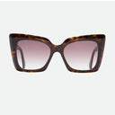 Tortoiseshell sunglasses with pink gradient lenses on a white background