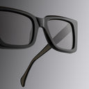 An image of the Cutler and Gross Valentina 002 Cat Eye Sunglasses in Black frame detail close up from right side view with gold logo in temples.