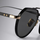 An image of the Draycott 1426 Round Sunglasses Black/Gold frame side view with arms open