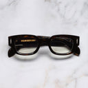 An image of the The Great Frog Soaring Eagle Square Optical Glasses in Havana frame frontal view with arms closed marble background