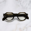 An image of the The Great Frog Lucky Diamond I Round Glasses in Olive frame frontal view with arms closed marble background