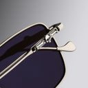 An image of the Cutler and Gross The Great Frog Capri Rectangular Sunglasses in Silver/Havana frame detail close up of right lens and temple.