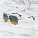An image of the Cutler and Gross The Great Frog Ganton Navigator Sunglasses in Gun Metal/Silver frame side view with arms open marble background.
