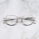 An image of the Pelham 1430 Round Opticals in Silver frame frontal view with arms closed marble background