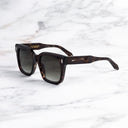 An image of the Breitling Marisol 0005 Square Sunglasses in Havana frame side view with arms open marble background