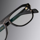 An image of the Cutler and Gross 0822V2 Aviator Horn Optical in Slate Grey Buffalo Horn frame detail close up of right lens and left temple