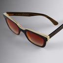 An image of the Cutler and Gross 4469 Square Horn Sunglass in Smoke Brown/Cream Buffalo Horn frame detail close up from right side view