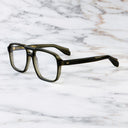 An image of the 1394 Aviator Optical in Multigreen frame side view with arms open marble background