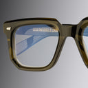 An image of the 1410 Square Optical (Large) in Olive frame detail close up from left side view