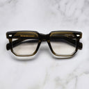 An image of the 1410 Square Optical (Large) in Olive frame frontal view with arms closed marble background