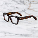 An image of the 1432 Square Optical in Dark Turtle frame side view with arms open marble background